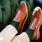 The Loafer in Chestnut Brown by Amberjack - worn with tan pants and amberjack olive dress socks