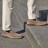 Model wearing The Slip On Slate paired with light dress pants