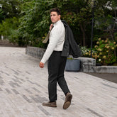 Model wearing The Slip on slate paired with dark gray suit