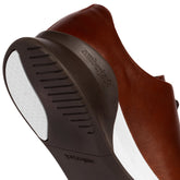 The Whole Cut Hybrid in Chestnut Brown - Outsole Close Up